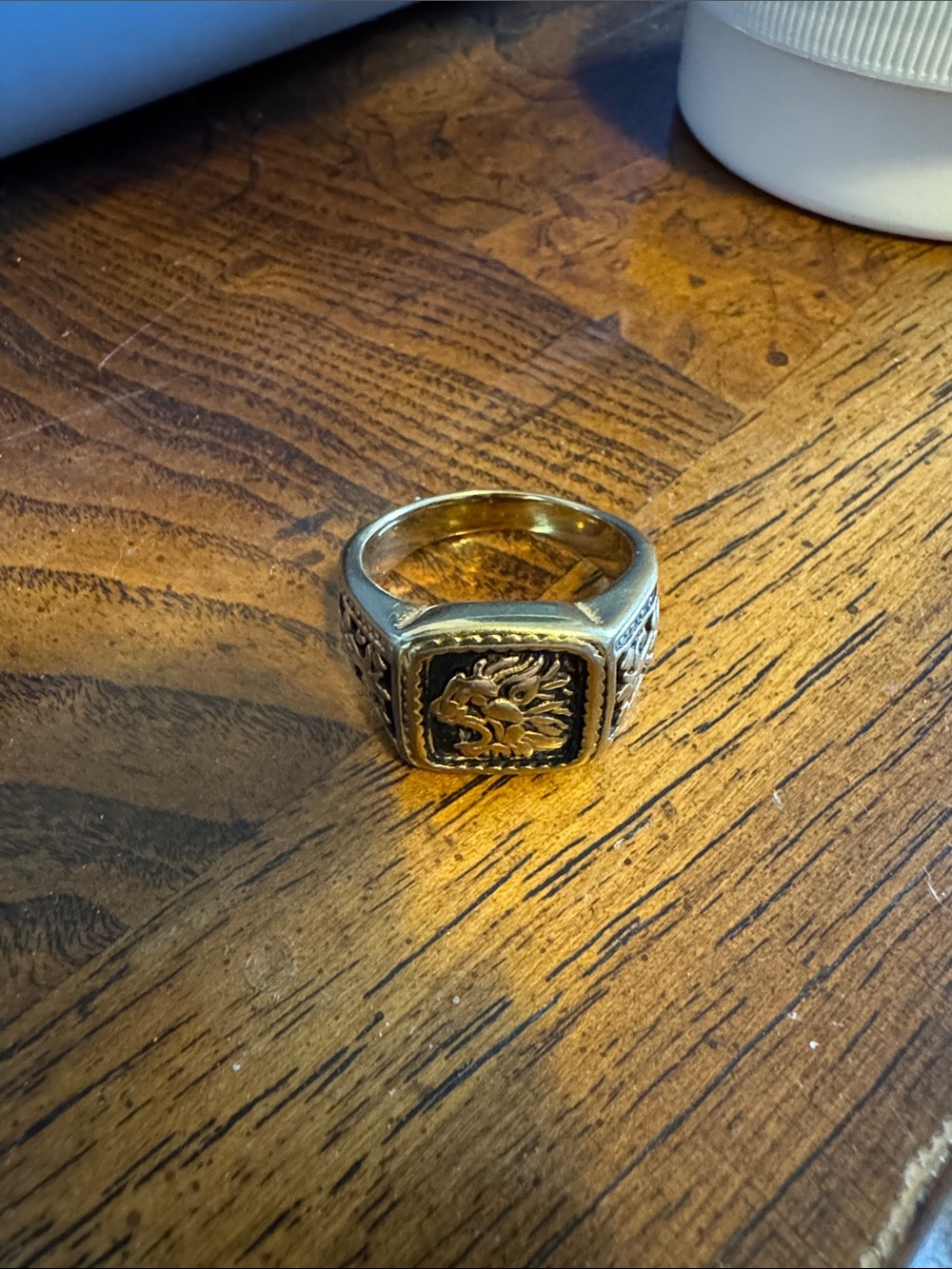 Men's Gold and Black Lion Emblem Signet Ring